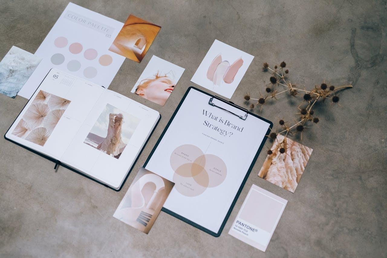 home-services-03 Flat lay of branding strategy materials with moodboard and color palette for creative design.